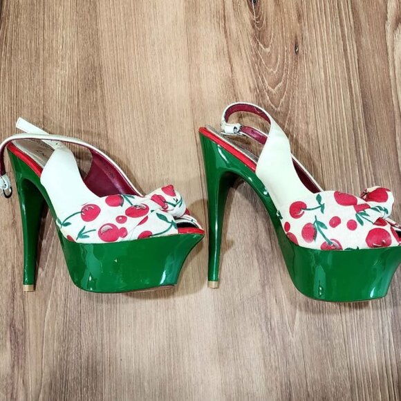 This is a pair of Bebe brand high-heeled sandals. - Picture 3 of 3